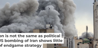 A plume of smoke rises after a strike in Tehran on March 2, 2026. AP Photo/Mohsen Ganji